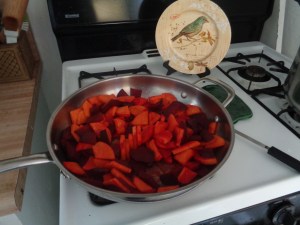 Cut slices of beets and yams cook in butter and olive oil. Simmer until soft. I didn't use any seasoning. Cool and serve.
